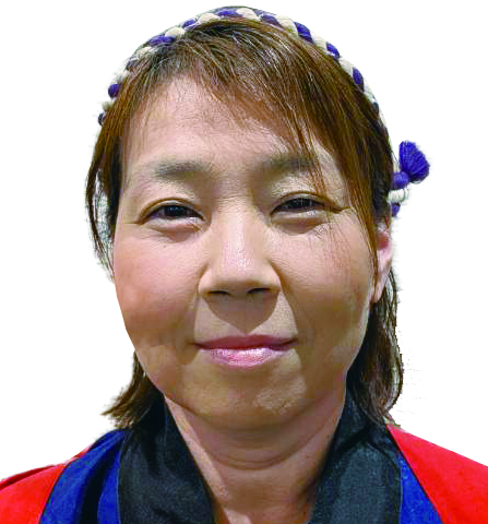 回転寿司すし丸児島店の店長 櫃本友美の写真